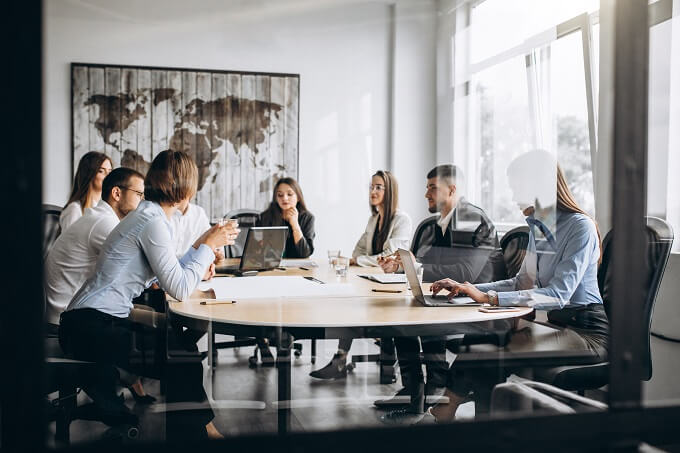 Group of people having discussion in a classroom