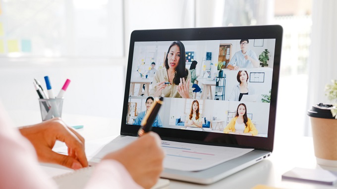 Woman on a virtual classroom meeting